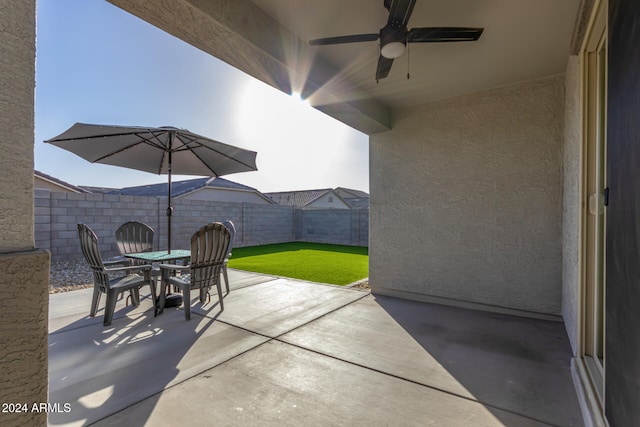 view of patio with ceiling fan