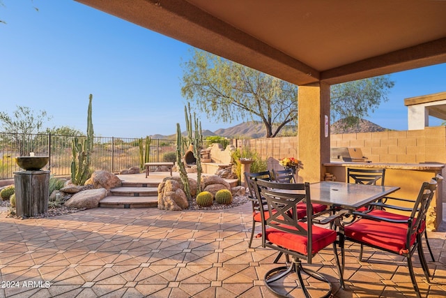 view of patio featuring a mountain view