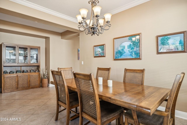 tiled dining space with an inviting chandelier and crown molding