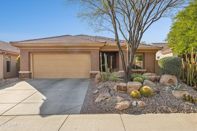 view of front of home with a garage