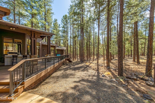 view of yard with a deck