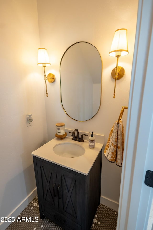 bathroom featuring tile patterned flooring and vanity