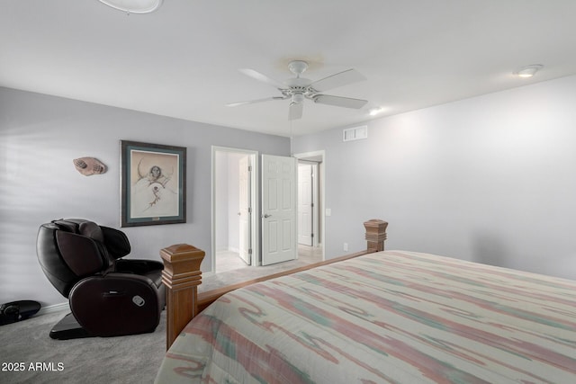 bedroom featuring ceiling fan and light carpet