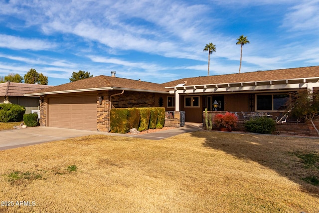 ranch-style house featuring a garage and a front lawn