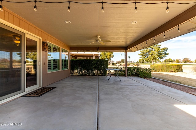 view of patio / terrace featuring ceiling fan