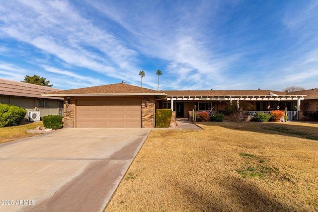 single story home with a front yard, ac unit, and a garage