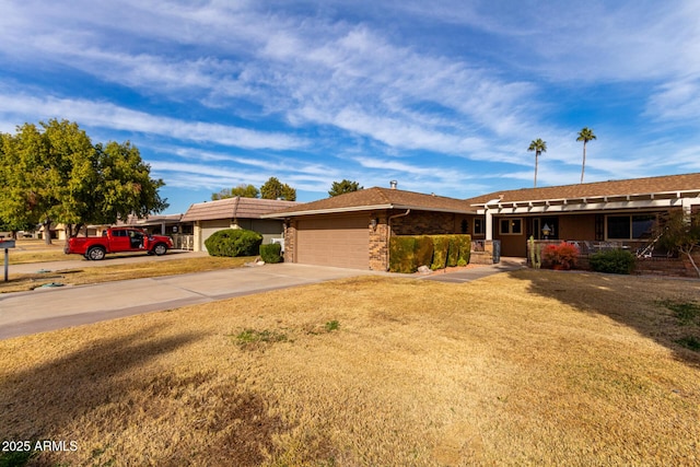 ranch-style home featuring a garage and a front yard