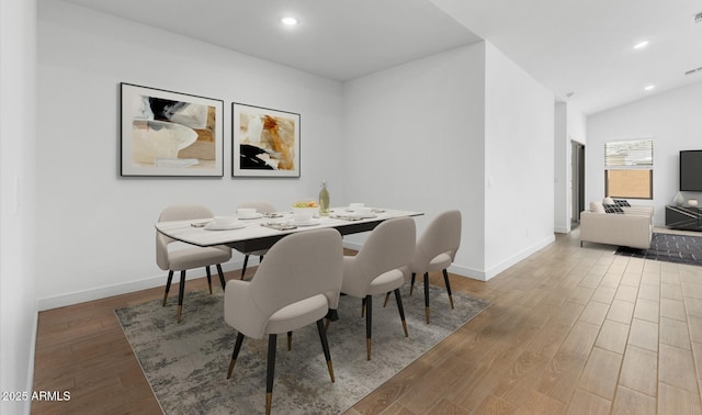 dining area featuring baseboards, visible vents, recessed lighting, and wood finished floors