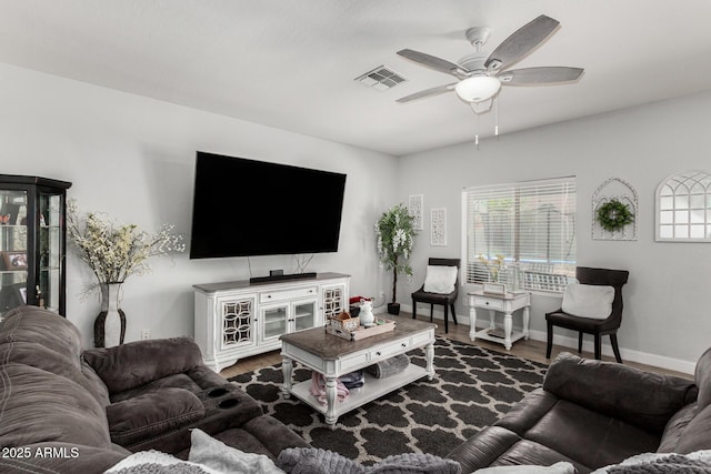 3545 W Tanner Ranch Rd, San Tan Valley, AZ 85144 - living room with ceiling fan, healthy amount of natural light, wood finished floors, and baseboards