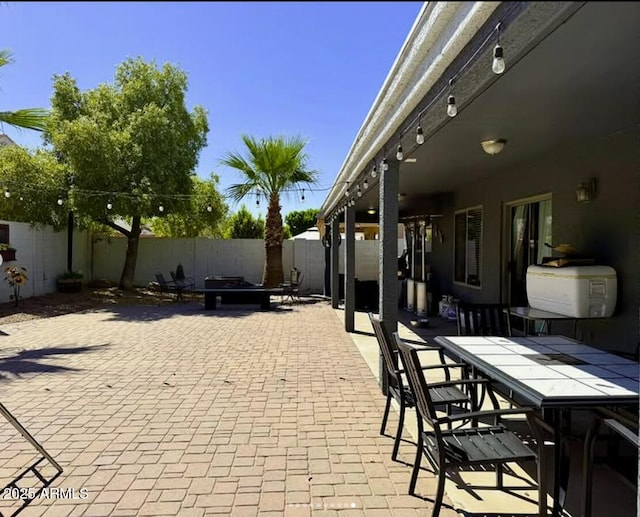 3545 W Tanner Ranch Rd, San Tan Valley, AZ 85144 - fenced backyard featuring outdoor dining area and a patio