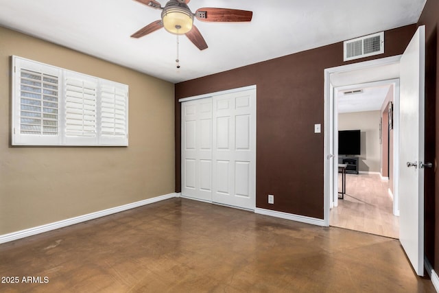 8331 N 6th St, Phoenix, AZ 85020 - unfurnished bedroom featuring a closet, concrete flooring, and ceiling fan