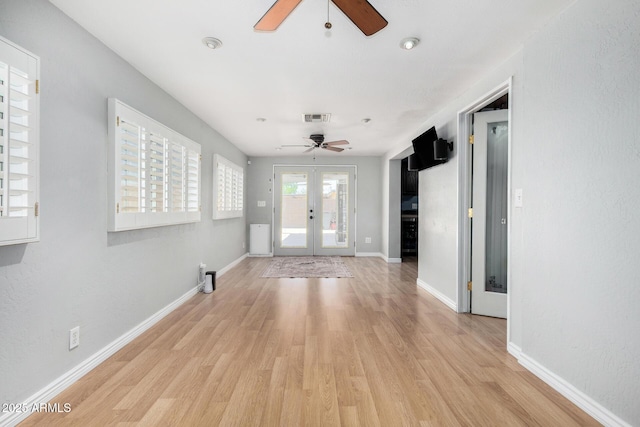 8331 N 6th St, Phoenix, AZ 85020 - entrance foyer featuring ceiling fan, french doors, and light wood-type flooring