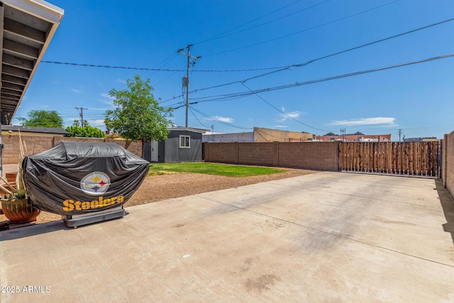 8331 N 6th St, Phoenix, AZ 85020 - fenced backyard with a patio area, grilling area, and a storage unit