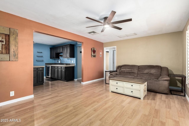 8331 N 6th St, Phoenix, AZ 85020 - living room featuring a ceiling fan, light wood-style flooring, and wine cooler