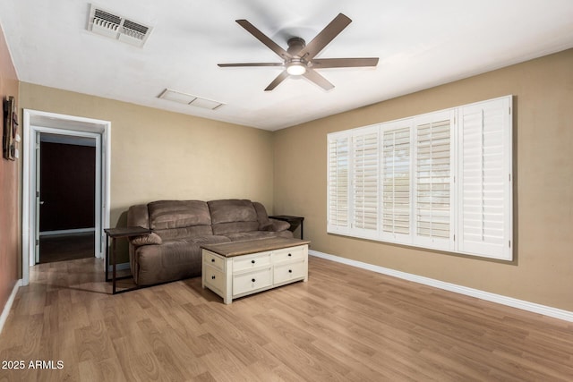 8331 N 6th St, Phoenix, AZ 85020 - living area featuring a ceiling fan and light wood-type flooring
