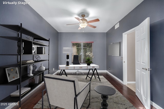 1210 E Azure Sea Ln, Gilbert, AZ 85234 - living room featuring a ceiling fan, wood finished floors, a desk, and baseboards