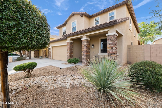 view of front of home with a garage