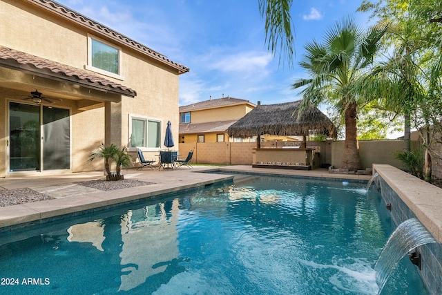 view of pool featuring a patio and pool water feature