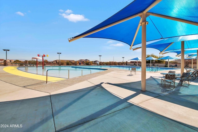 view of pool featuring a patio