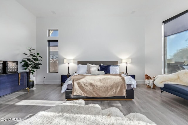 bedroom featuring hardwood / wood-style flooring