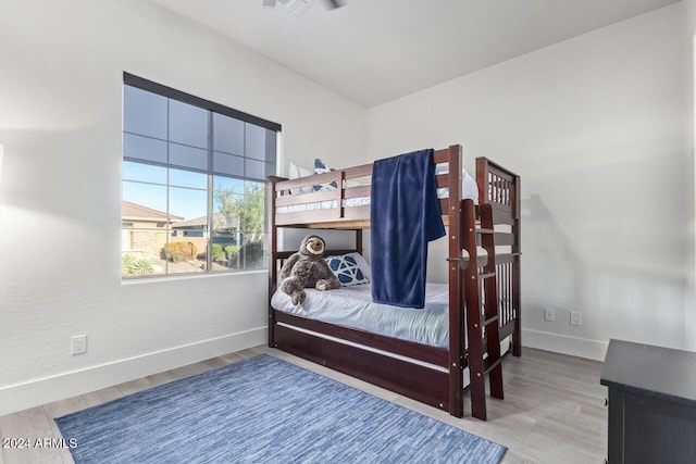 bedroom featuring hardwood / wood-style flooring