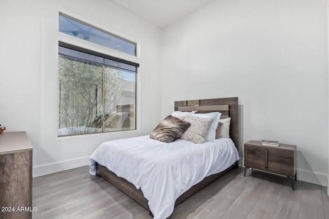 bedroom featuring light hardwood / wood-style flooring