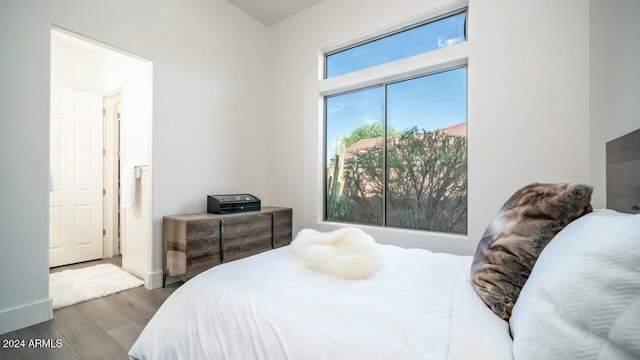 bedroom featuring hardwood / wood-style flooring