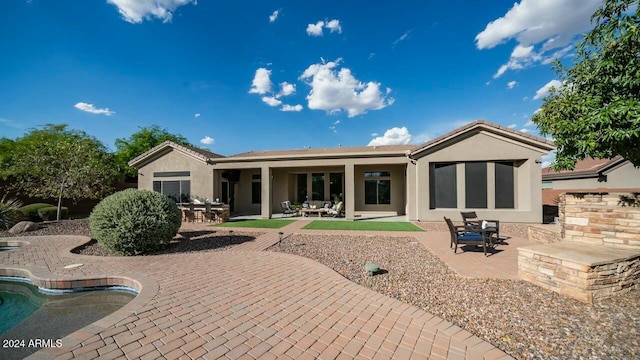 rear view of property with a patio