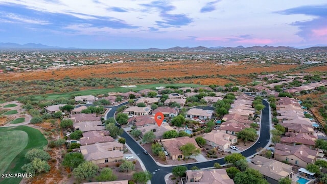 aerial view at dusk with a mountain view