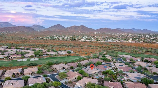 birds eye view of property featuring a mountain view