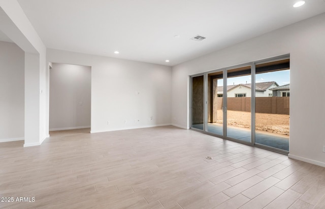 22523 E Orchard Ln, Queen Creek, AZ 85142 - empty room featuring light wood finished floors, baseboards, and recessed lighting