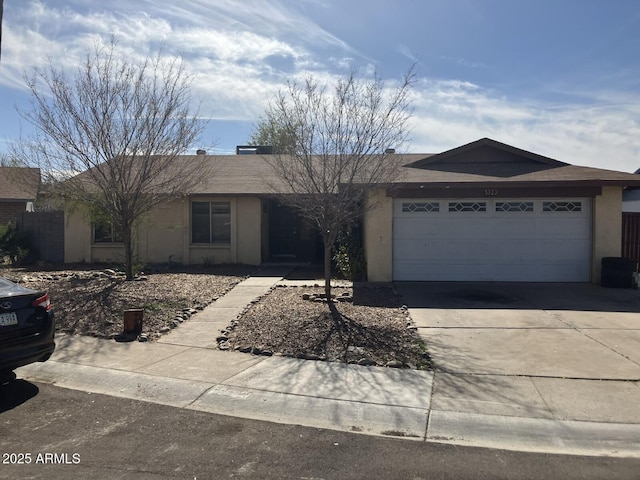 single story home with a garage