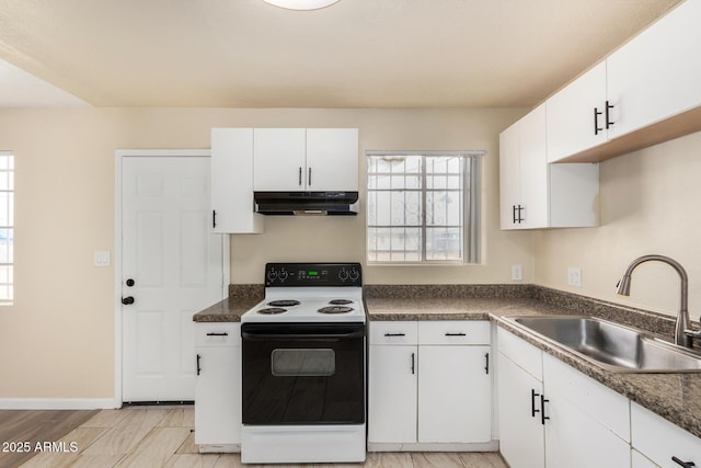 kitchen featuring dark countertops, under cabinet range hood, electric range oven, white cabinetry, and a sink