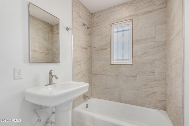 bathroom with shower / washtub combination