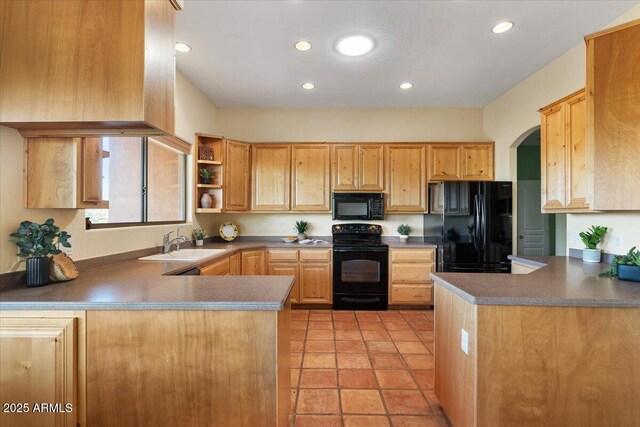 28607 N 152nd St, Scottsdale, AZ 85262 - kitchen with a sink, black appliances, open shelves, and a peninsula