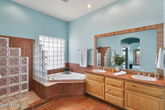 28607 N 152nd St, Scottsdale, AZ 85262 - bathroom featuring a sink, a garden tub, tile patterned flooring, walk in shower, and double vanity