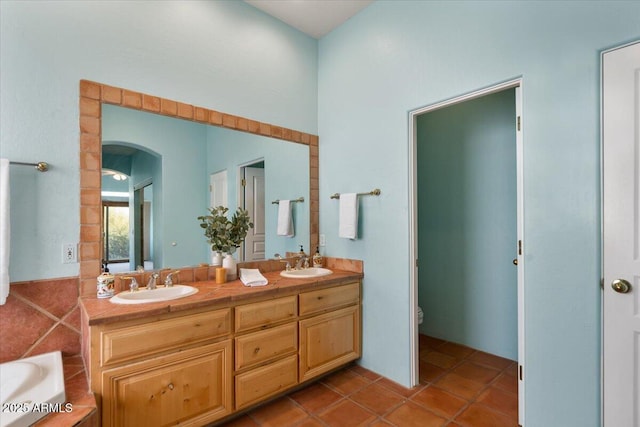28607 N 152nd St, Scottsdale, AZ 85262 - bathroom featuring toilet, double vanity, a sink, and tile patterned floors
