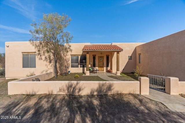 28607 N 152nd St, Scottsdale, AZ 85262 - pueblo-style home with stucco siding and a tile roof