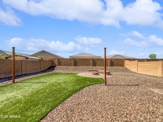 view of yard with a fenced backyard