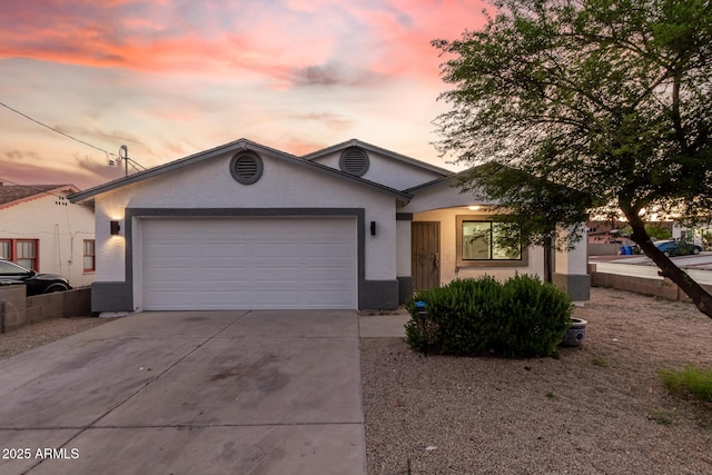 8846 N 3rd St, Phoenix, AZ 85020 - single story home featuring a garage, driveway, and stucco siding