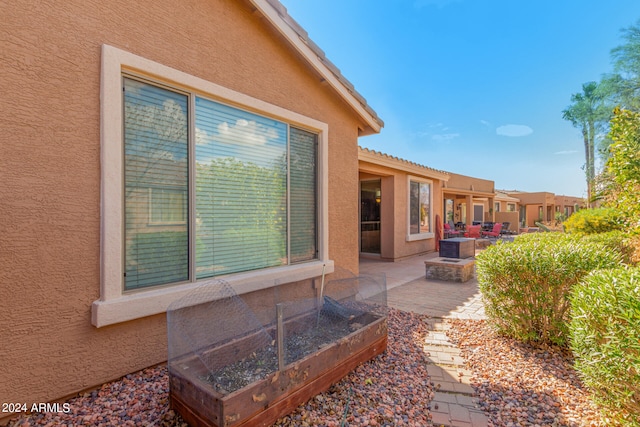 exterior space featuring a patio area