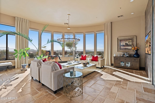 living room with a notable chandelier