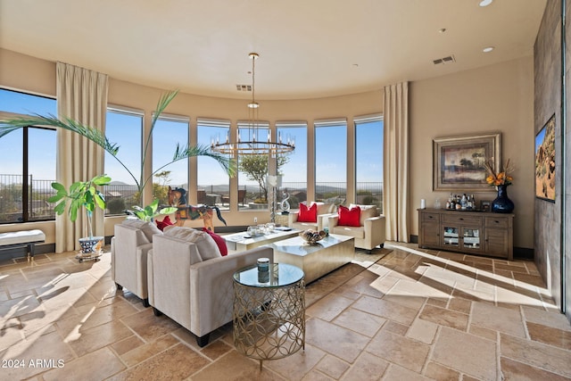 2549 W Shinnecock Way, Anthem, AZ 85086 - living room featuring stone tile flooring and recessed lighting