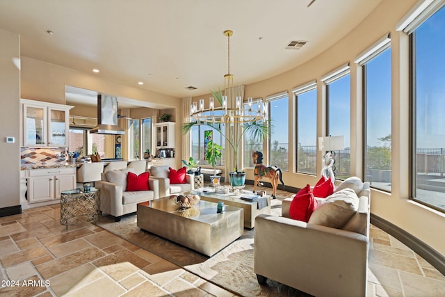 living room featuring a chandelier