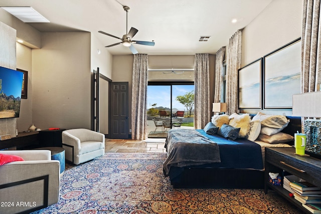 bedroom featuring access to exterior and ceiling fan