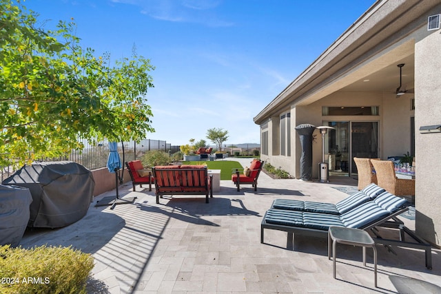 view of patio / terrace featuring an outdoor hangout area, ceiling fan, and a grill