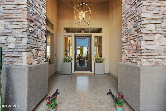 2549 W Shinnecock Way, Anthem, AZ 85086 - doorway to property with stone siding and stucco siding