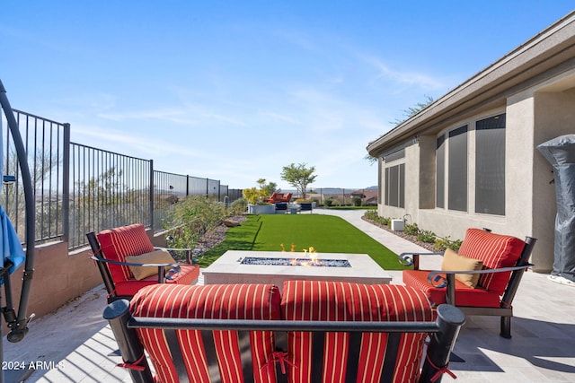 view of patio / terrace featuring a fire pit