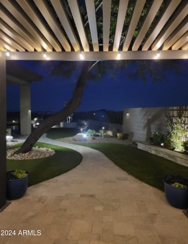 view of patio at twilight