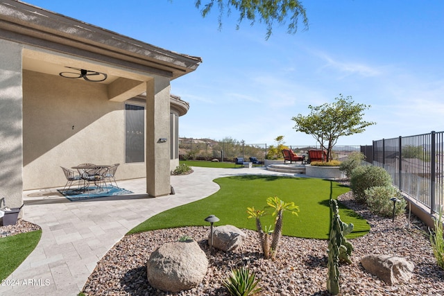 view of yard with a patio area